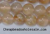 CAA1073 15.5 inches 10mm round sakura agate gemstone beads