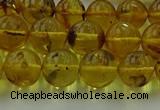 CAR523 15.5 inches 8mm - 9mm round natural amber beads wholesale
