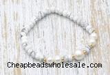 CFB702 faceted rondelle white howlite & potato white freshwater pearl stretchy bracelet