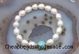 CFB926 9mm - 10mm rice white freshwater pearl & blue sea sediment jasper stretchy bracelet