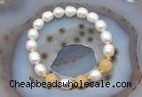 CFB928 9mm - 10mm rice white freshwater pearl & honey jade stretchy bracelet