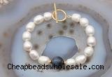 CFB979 Hand-knotted 9mm - 10mm rice white freshwater pearl & blue tiger eye bracelet