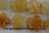 CFG1000 15.5 inches 16mm carved flower yellow jade beads