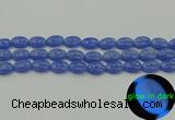 CLU181 15.5 inches 10*14mm oval blue luminous stone beads