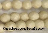 CRJ626 15.5 inches 4mmm faceted round white fossil jasper beads