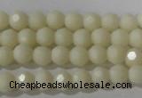 CTU1440 15.5 inches 4mm faceted round synthetic turquoise beads