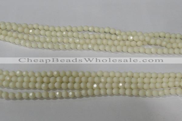 CTU1440 15.5 inches 4mm faceted round synthetic turquoise beads