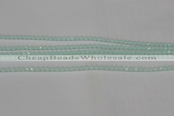 CTU2571 15.5 inches 4mm faceted round synthetic turquoise beads