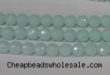 CTU2572 15.5 inches 6mm faceted round synthetic turquoise beads