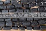TUBE122 15 inches 6*11mm - 8*14mm faceted tube black tourmaline beads